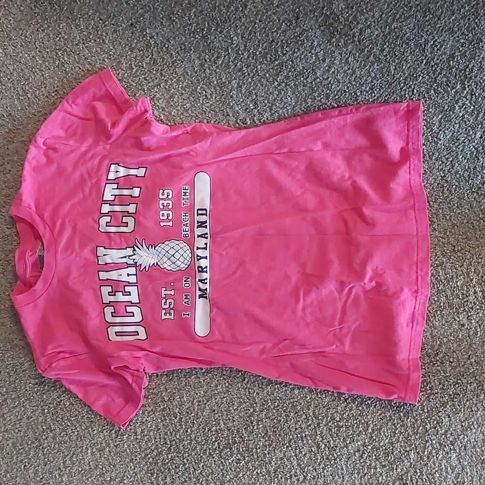 A pink Ocean City souvenir shirt
